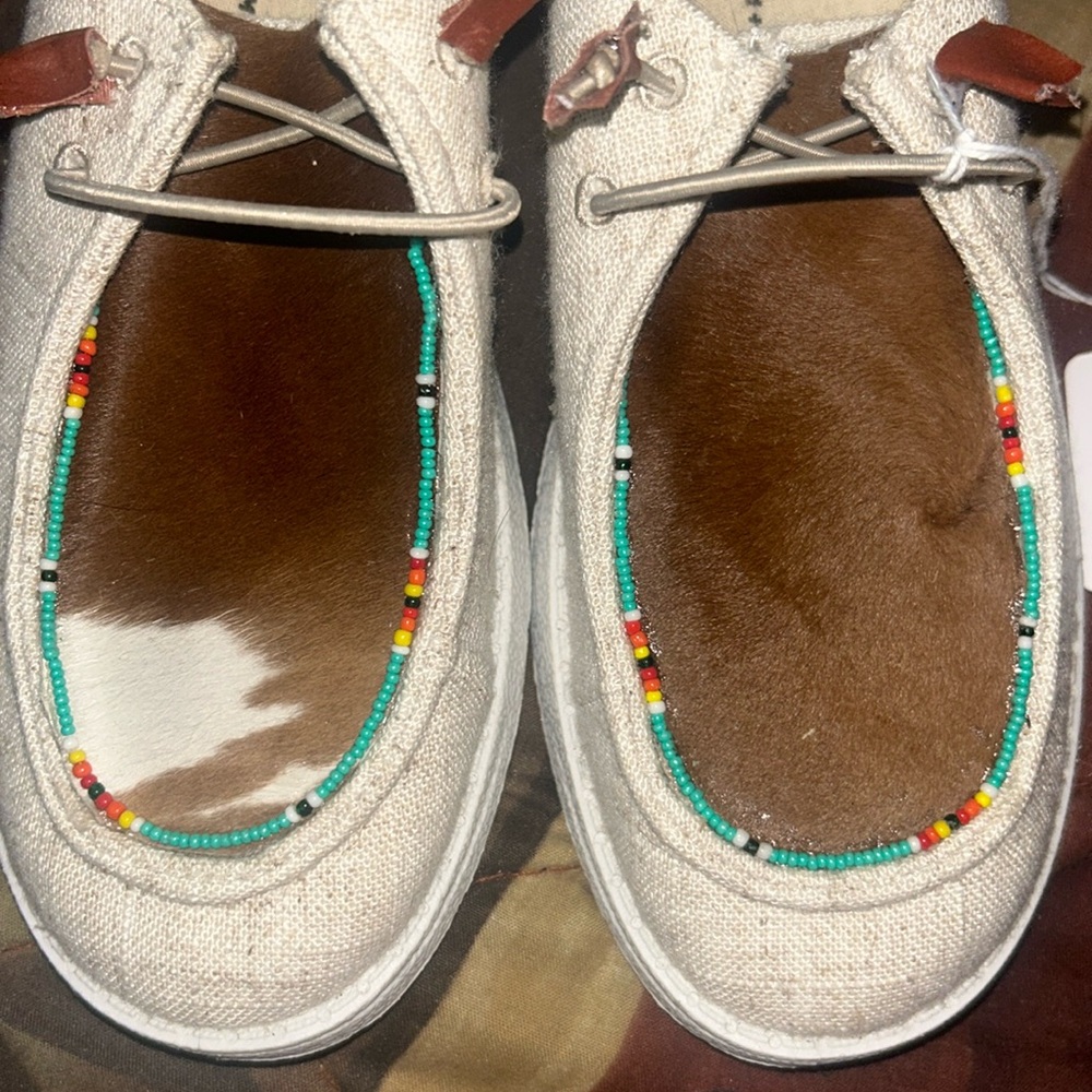 Like new custom cowhide slip on shoes